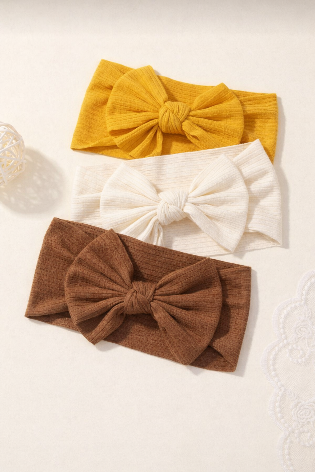 88A51BA3-837F-47F2-86E2-F26AFD251B9E Textured Fabric Nylon Bow Headband - Image 1