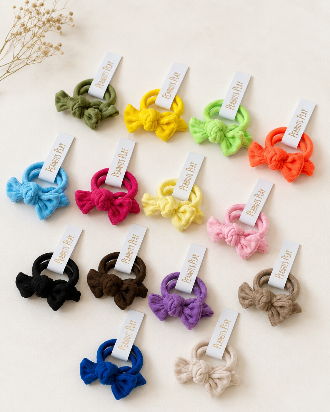 5B32488E-E216-4FCF-81C3-2F9453C4A4E3 Bow Pop Hair Ties - Image 1