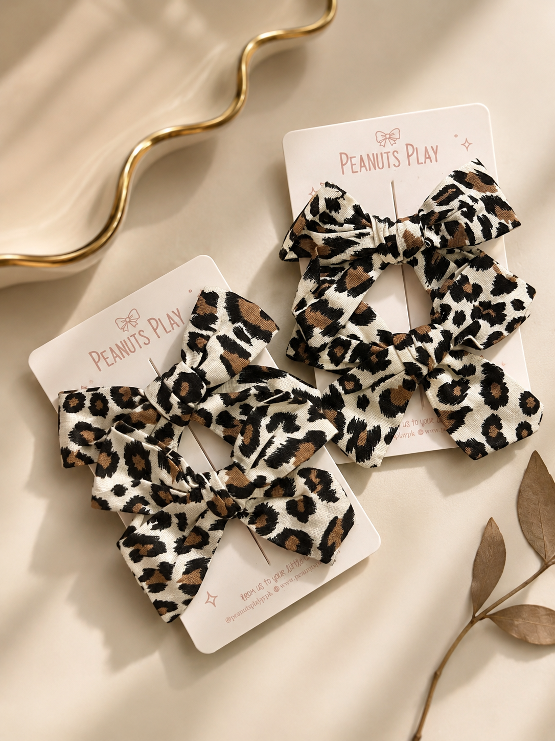 B874025F-3C1F-493A-A2D8-F312F4CAC805 Leopard Print Bow - Image 1