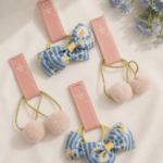 Daisy Bow & Pom Pom Hair Tie