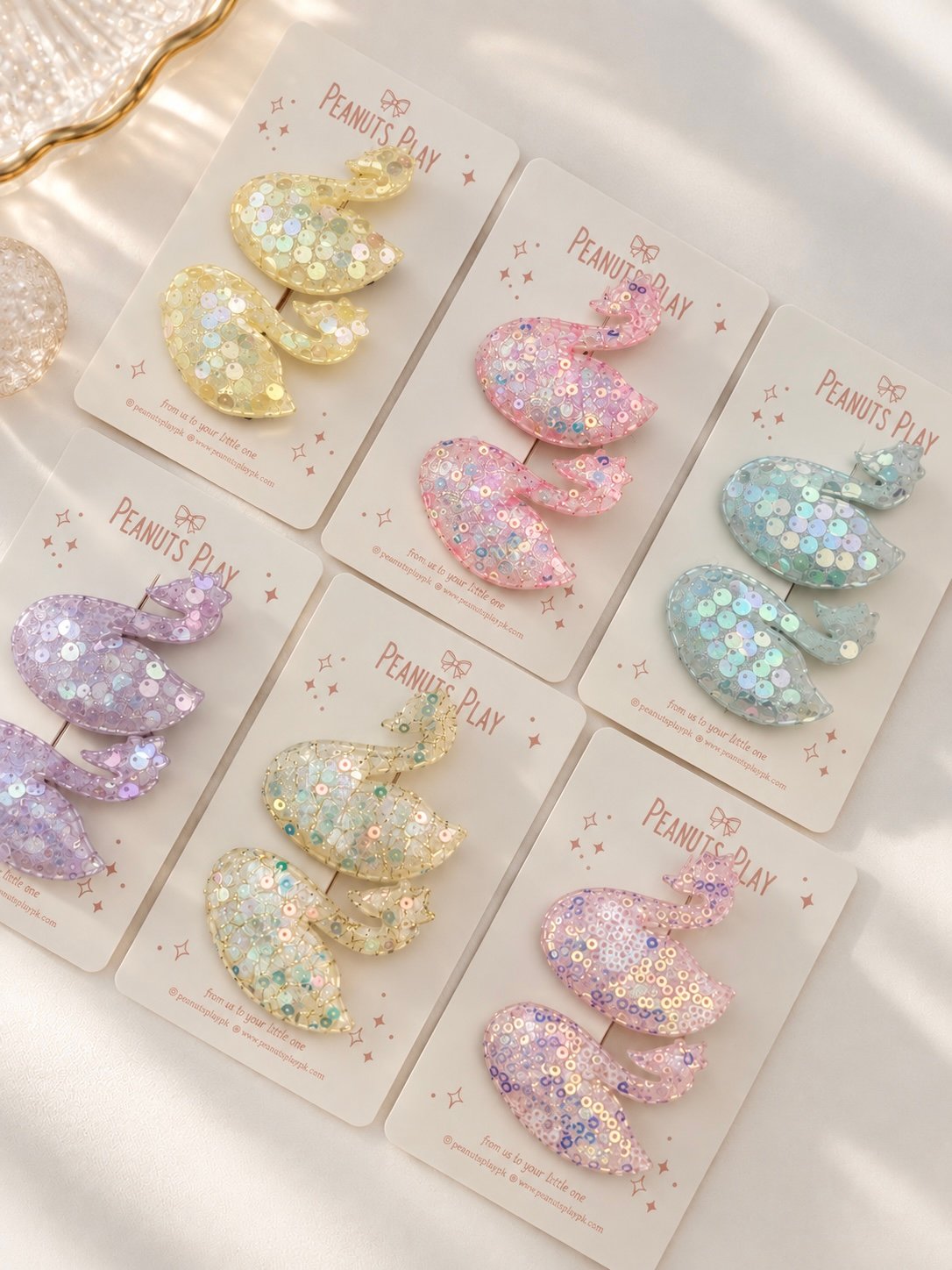 44 (2) Sparkle Swan Clips - Image 1
